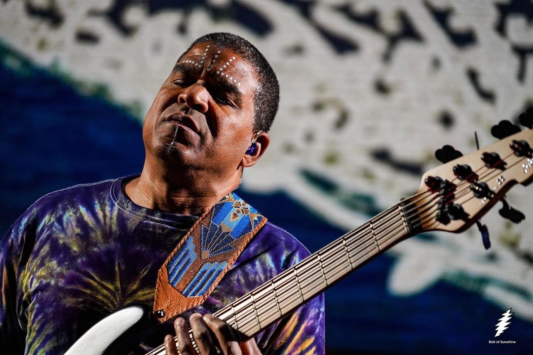 Close up of Oteil Burbridge playing bass on stage with Dead & Co. in Phoenix